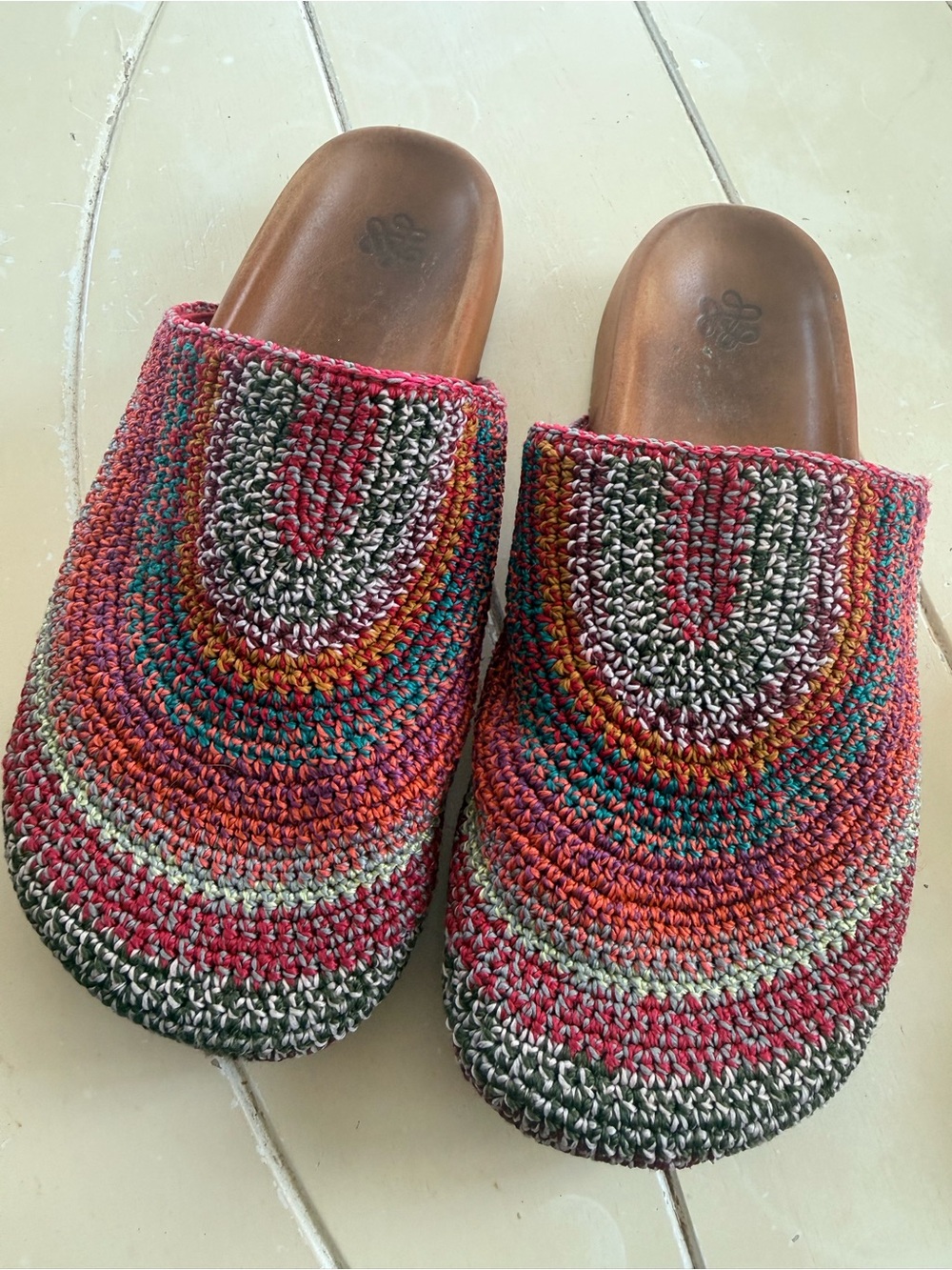 The Sak Multicolor Crochet Slip-On Slippers in Red, Green, Teal, Purple